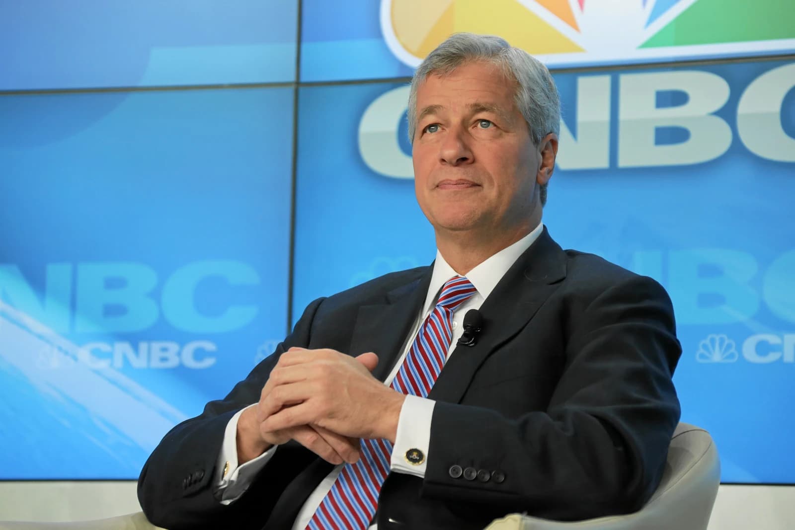Jamie Dimon, CEO of JPMorgan Chase, seated during an interview.