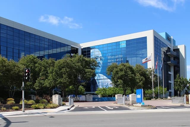 Exterior of Intel Corporation headquarters building under a blue sky.