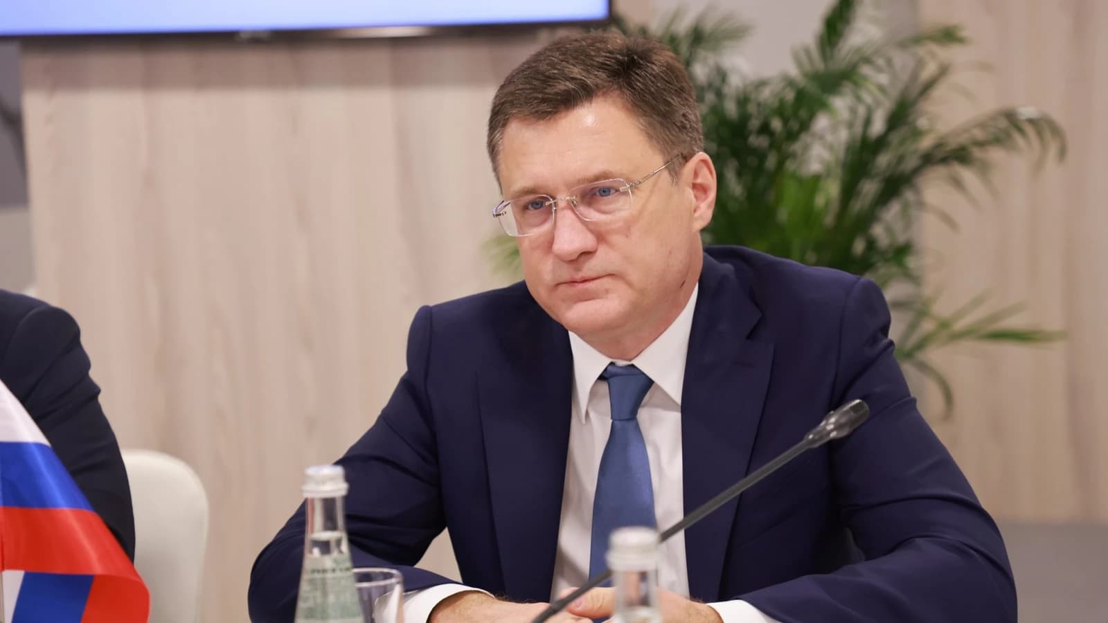 Alexander Novak, Russian Deputy Prime Minister, seated at a conference table.