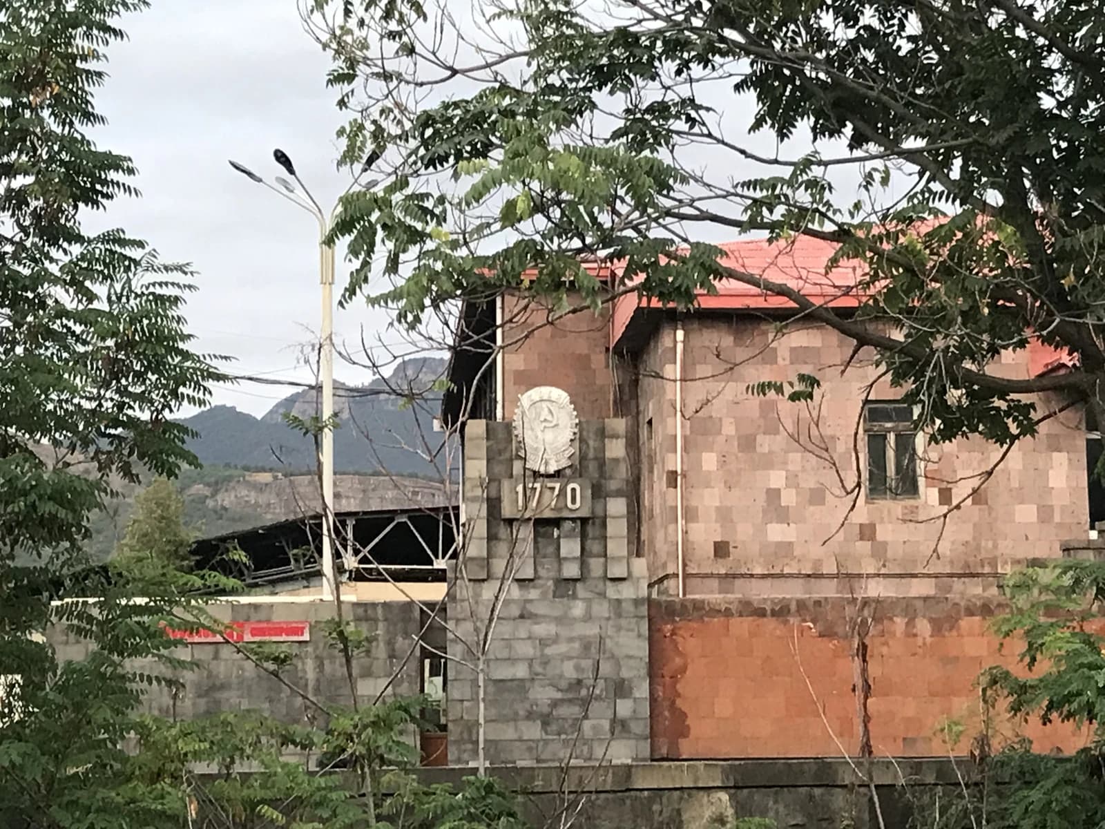 Entrance to the Alaverdi copper smelter with a 1770 plaque on the facade.