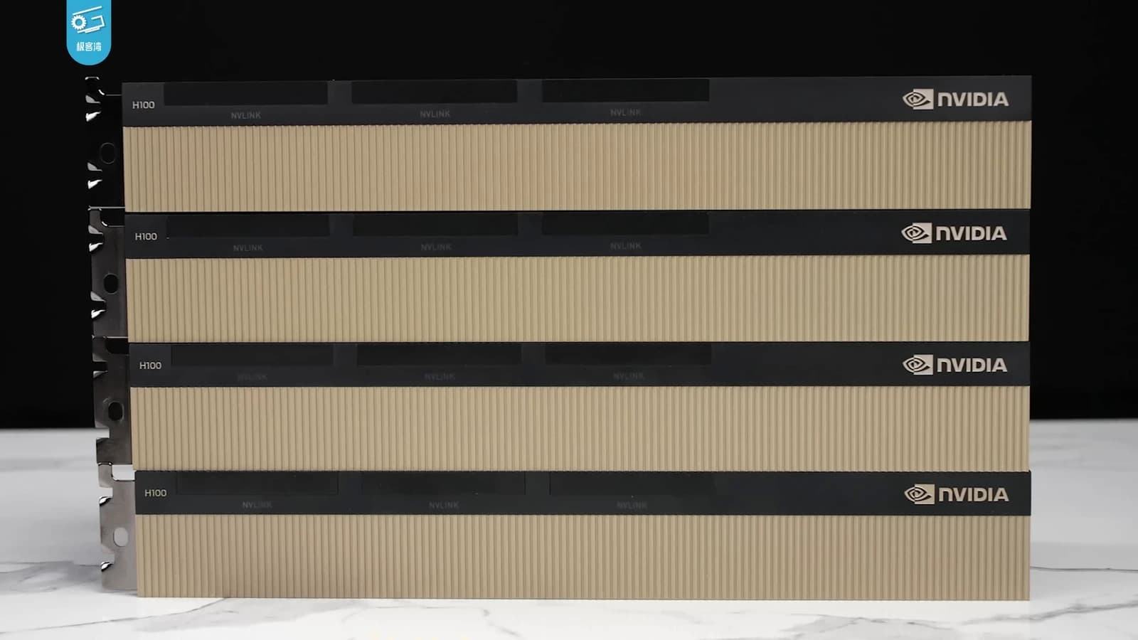 Several NVIDIA H100 GPU server modules are stacked vertically in a controlled environment.