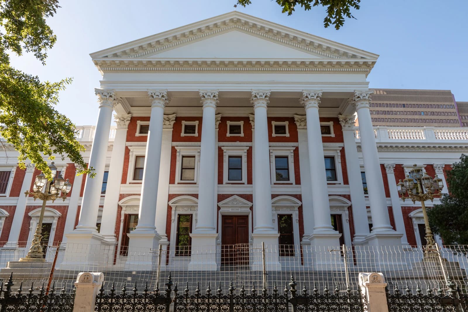Parliament of South Africa building with columns and brick facade in Cape Town.