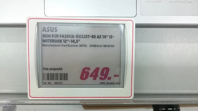 Electronic shelf label showing '649.- EURO' for an ASUS laptop.
