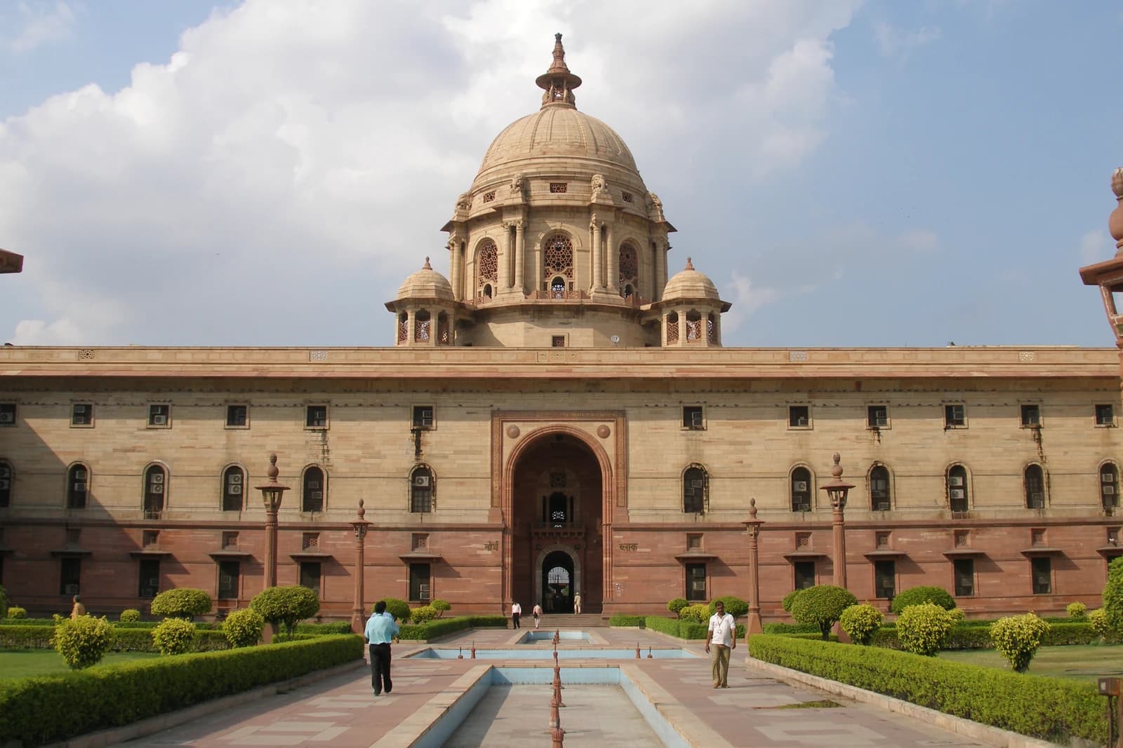 Secretariat Building in Delhi, India, with a large dome and an arched entrance.