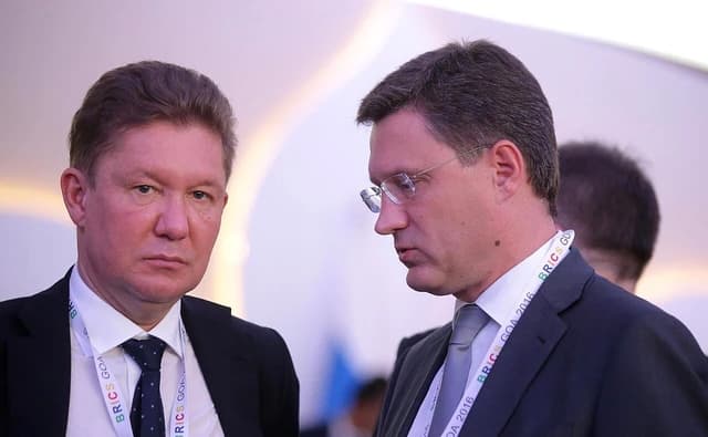 Alexei Miller and Alexander Novak at a conference in Goa, India.