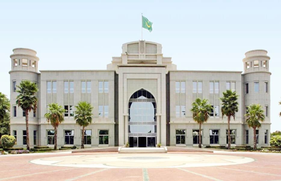 Mauritania Presidential Palace, a modern gray building with a prominent arched entrance.
