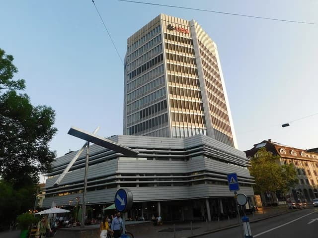 UBS headquarters building in Zurich, Switzerland, under a clear sky.