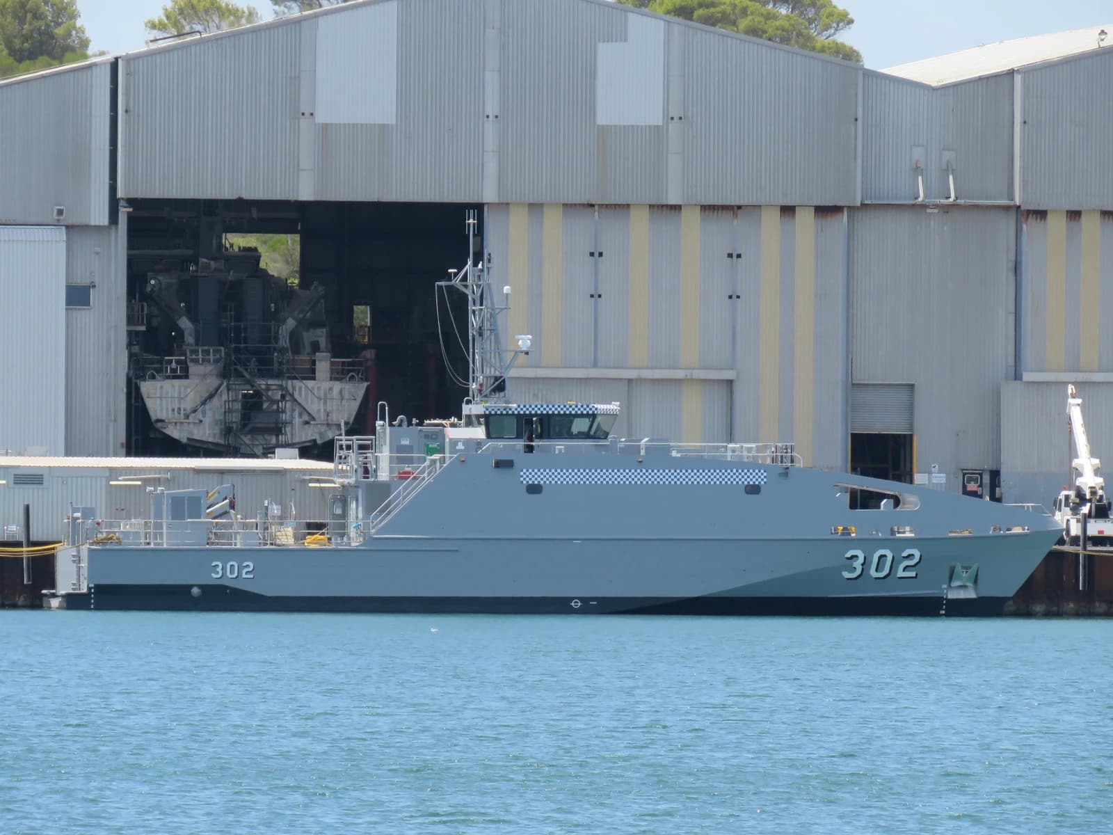 Patrol boat Tobwaan Mainiku (302) docked at Austal shipyards in Henderson, Western Australia.