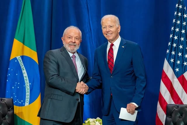 President Joe Biden and President Luiz Inácio Lula da Silva shaking hands.