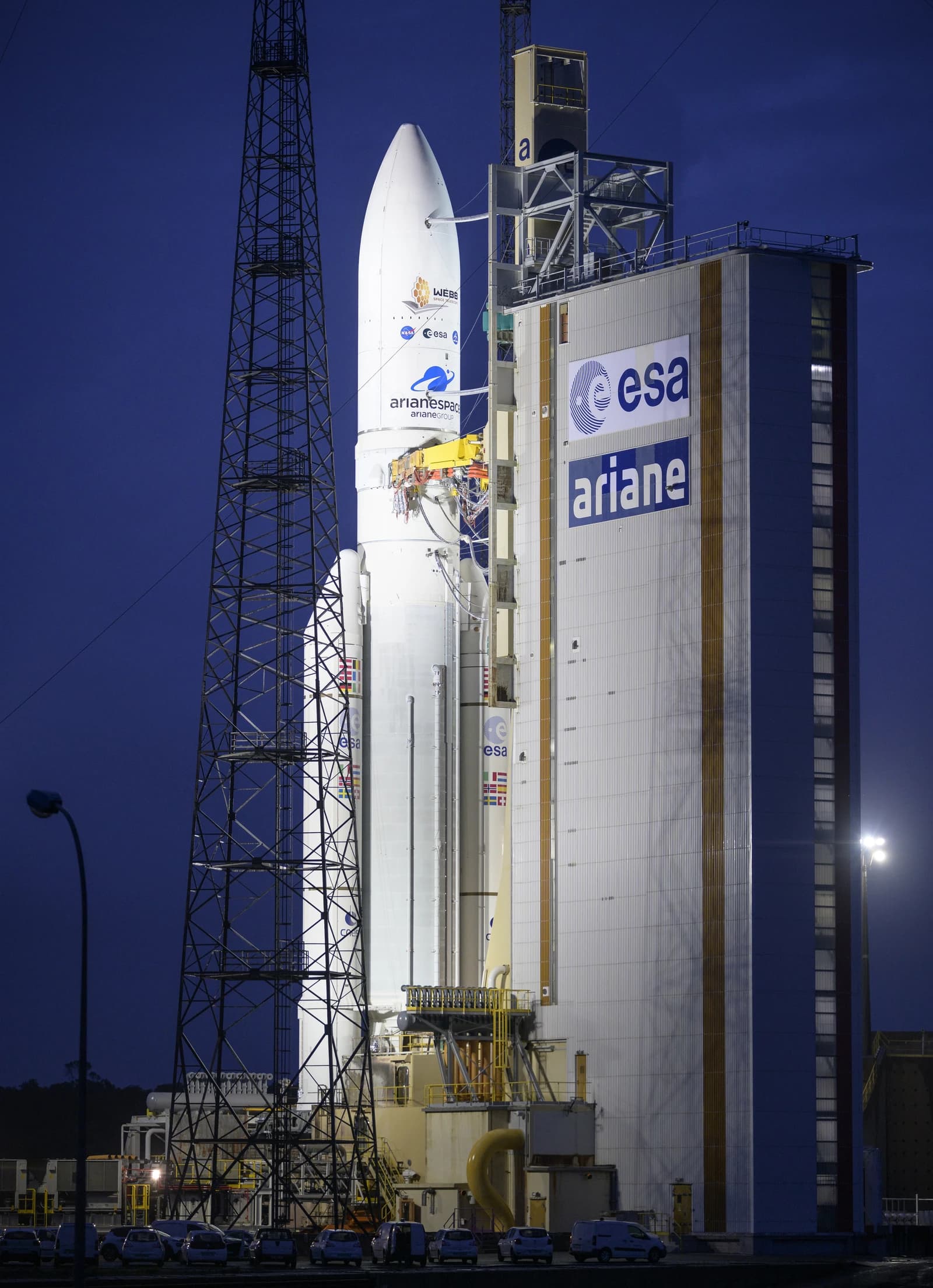 Ariane 5 rocket with James Webb Space Telescope attached, at launchpad.