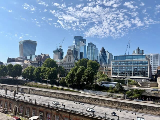 Skyline of the City of London financial district with modern skyscrapers and historical buildings.