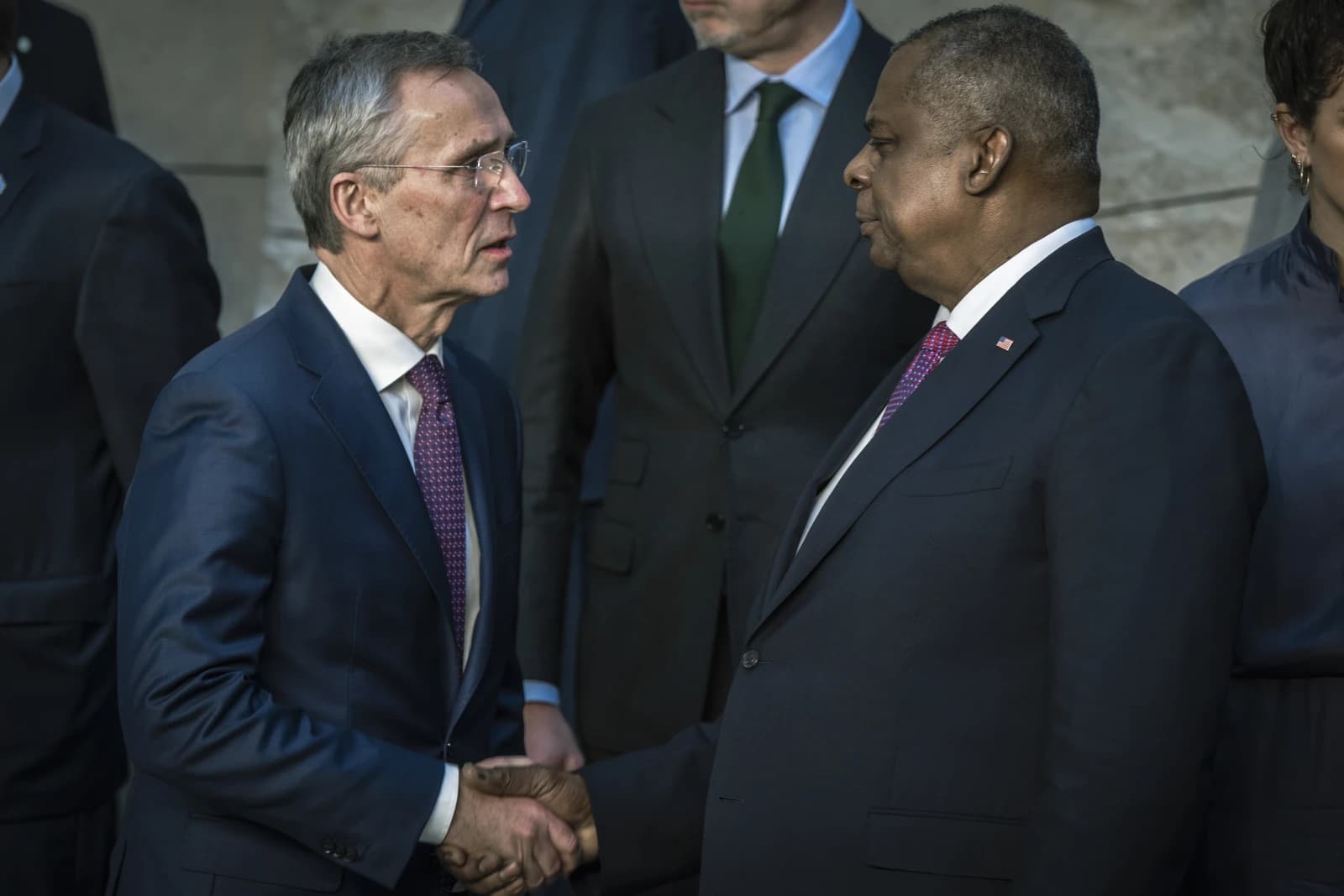 US Secretary of Defense Lloyd Austin shakes hands with NATO Secretary General Jens Stoltenberg.