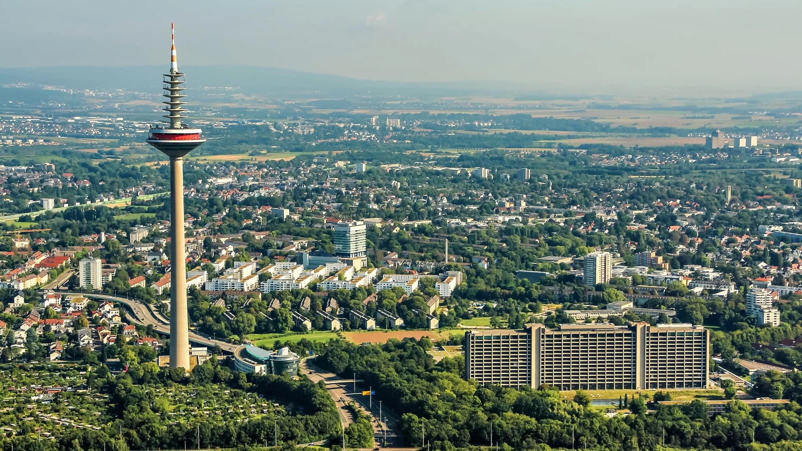 Aerial view of Frankfurt am Main showing Europaturm and German Federal Bank building.
