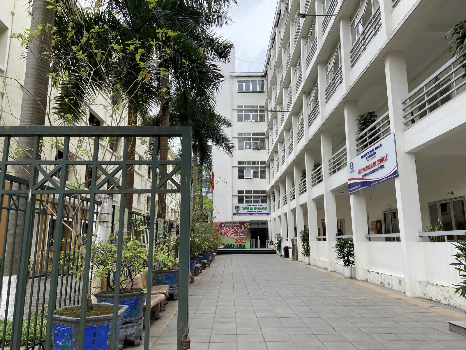 Exterior view of the white building of the University of Education in Hanoi, Vietnam.