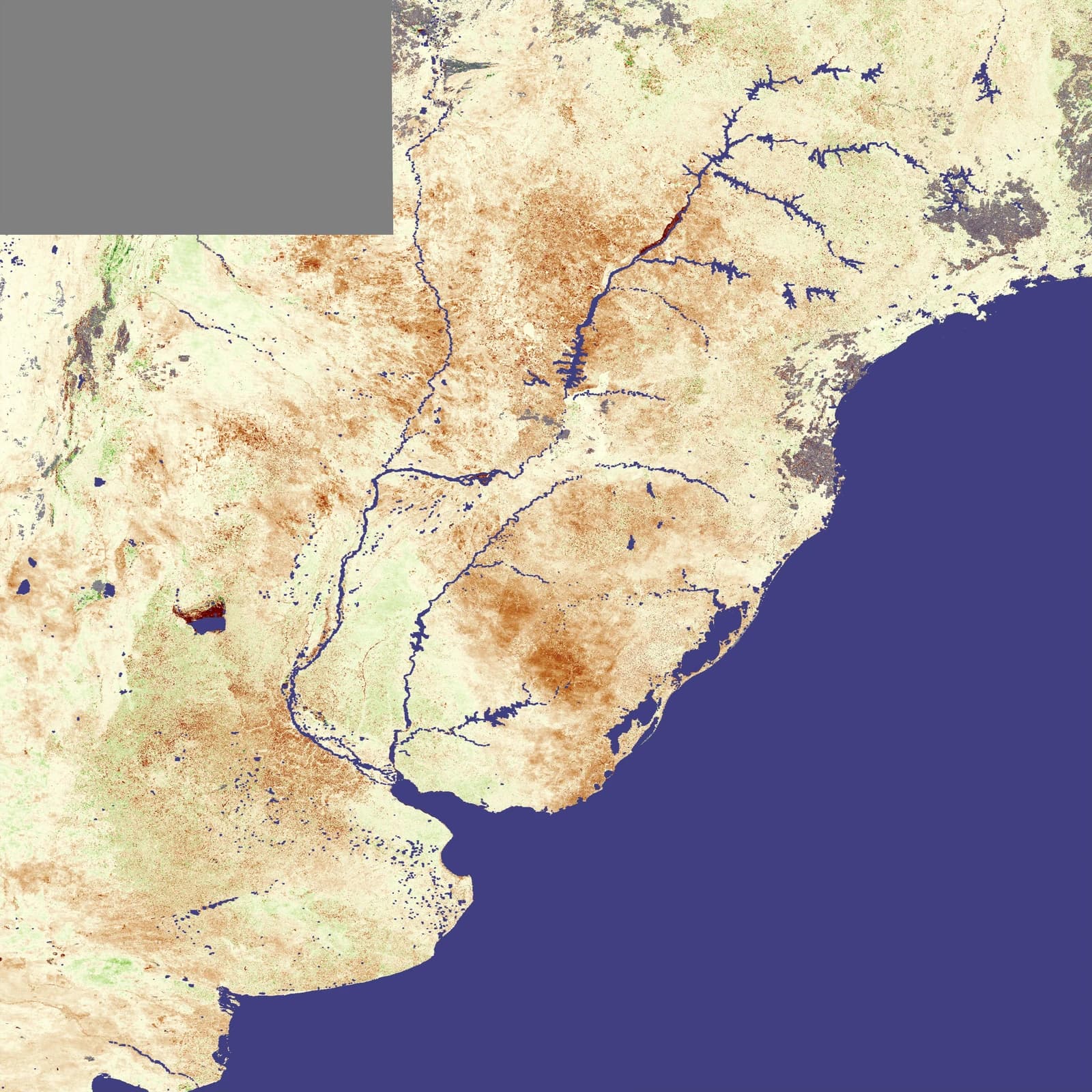 Satellite image showing areas of drought across a landscape with rivers and coastline.