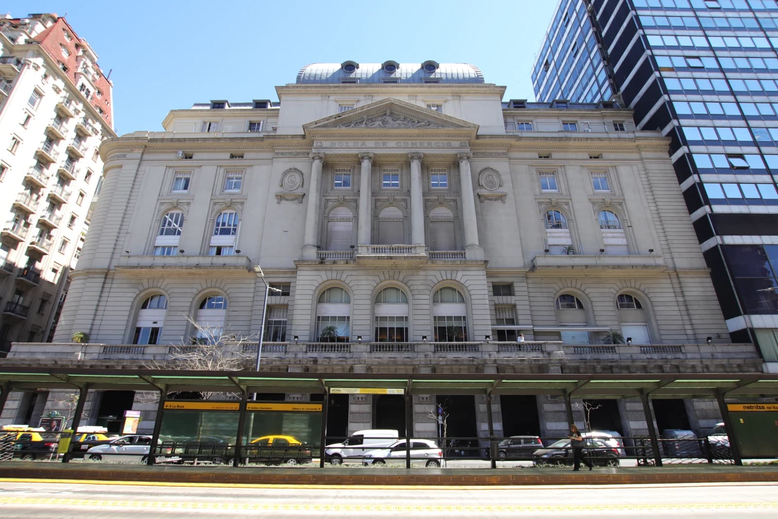 The Bolsa de Comercio de Buenos Aires building stands tall on a sunny day.