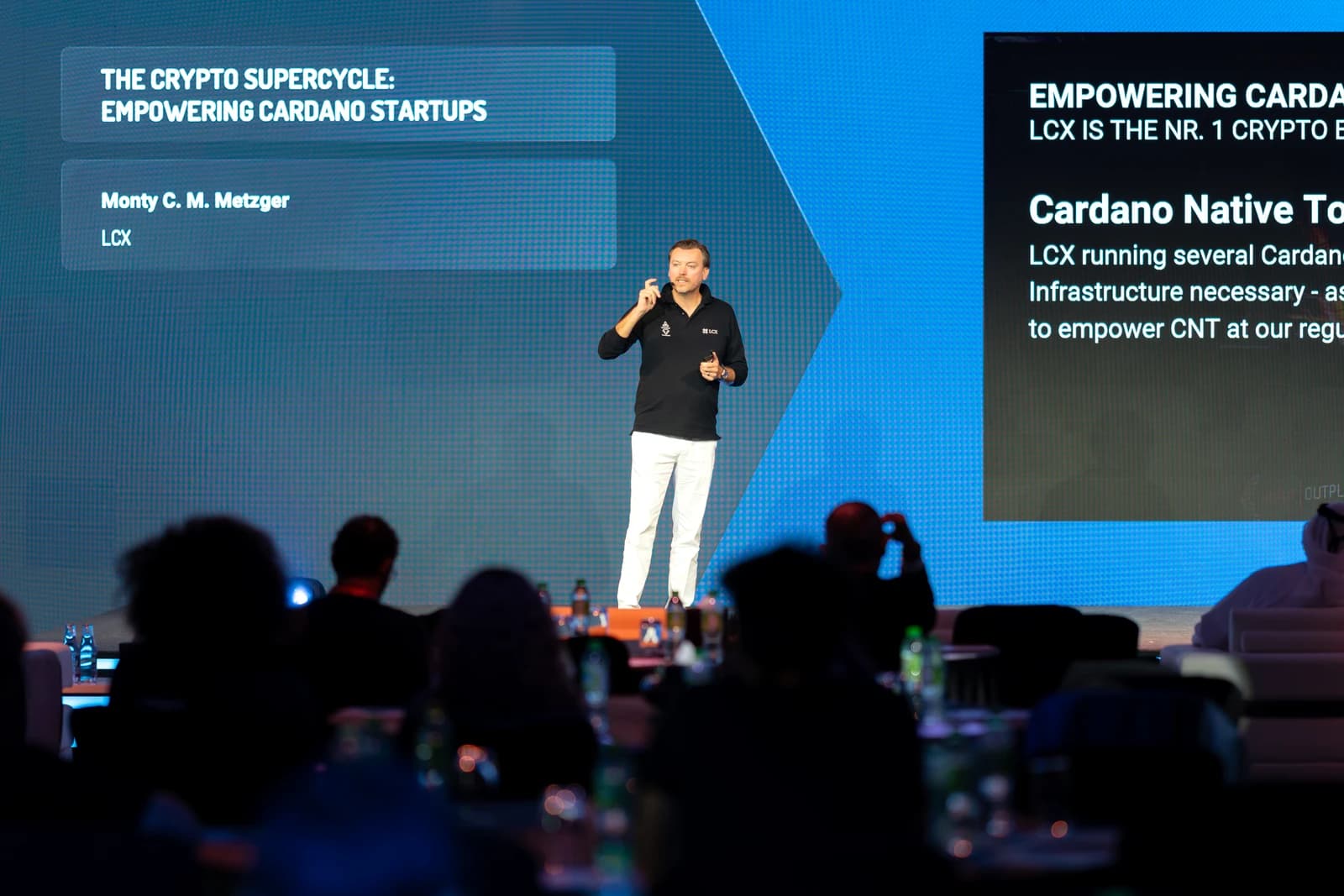 Monty Metzger, CEO at LCX, giving a keynote speech at a blockchain conference.