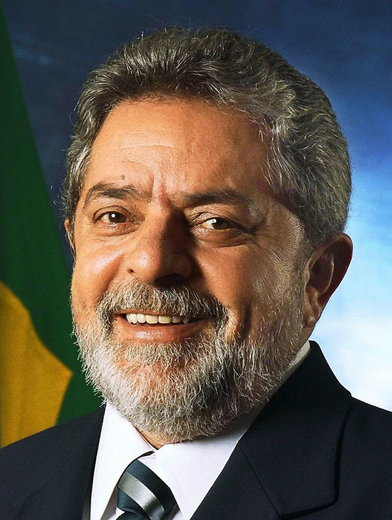 Luiz Inácio Lula da Silva, former President of Brazil, smiling in a formal portrait.