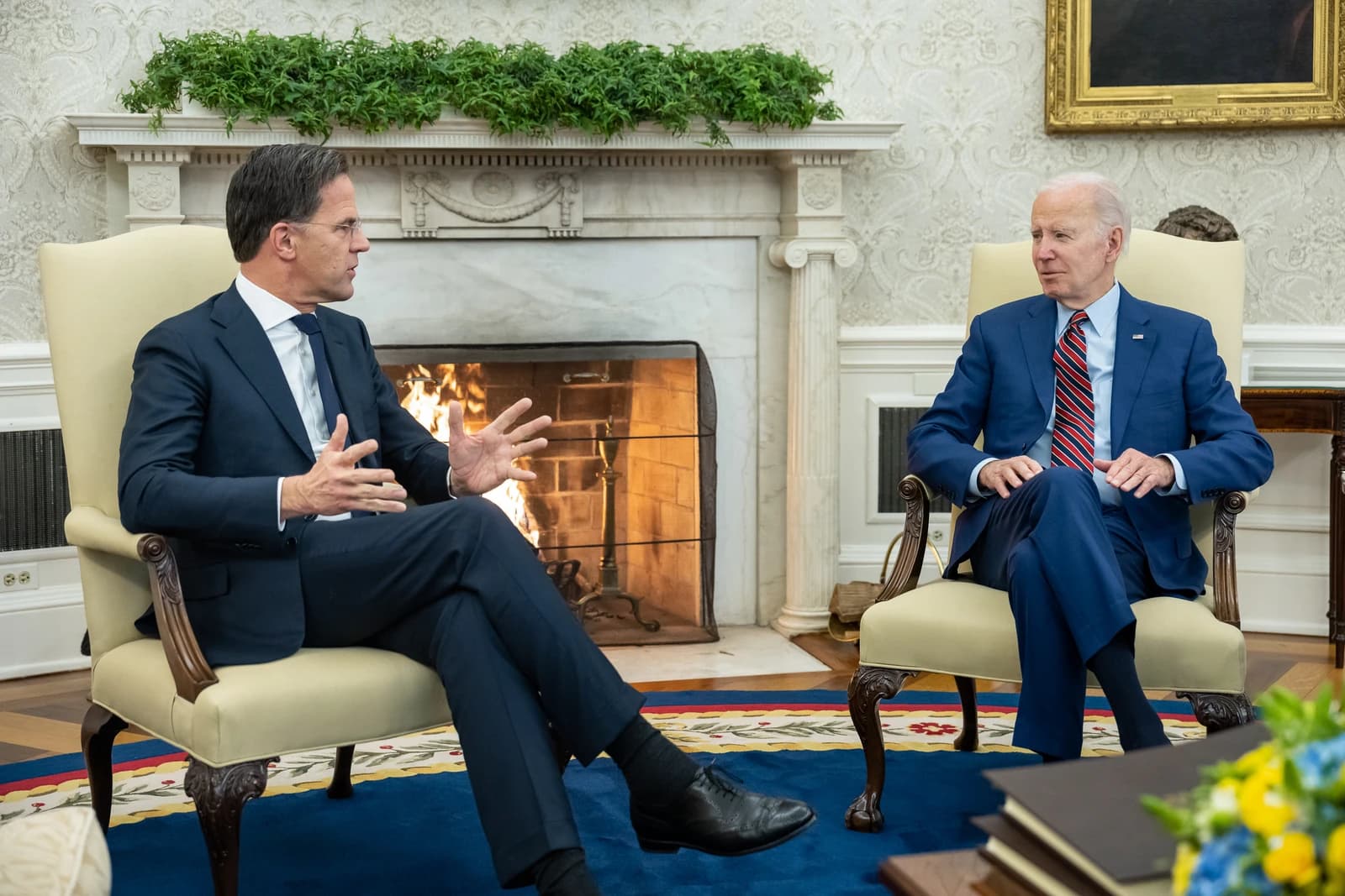 Prime Minister Mark Rutte of the Netherlands gestures while speaking to President Joe Biden.