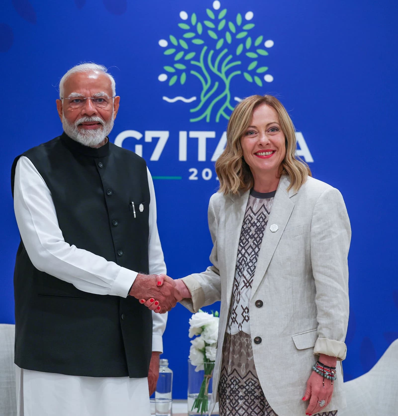 Giorgia Meloni, Prime Minister of Italy, shaking hands with Narendra Modi, Prime Minister of India, at the G7 Summit.