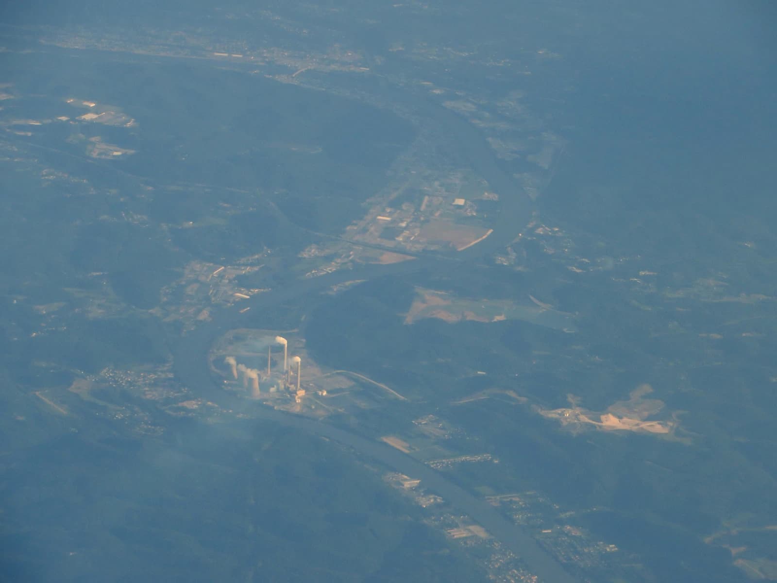 Aerial view showing John E. Amos Power Plant and surrounding landscape by the Kanawha River.