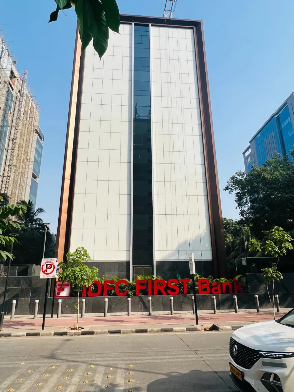 IDFC First Bank headquarters building on a clear day.
