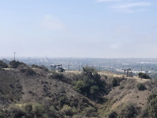 Pumpjacks extracting oil from the ground at Inglewood Oil Field.