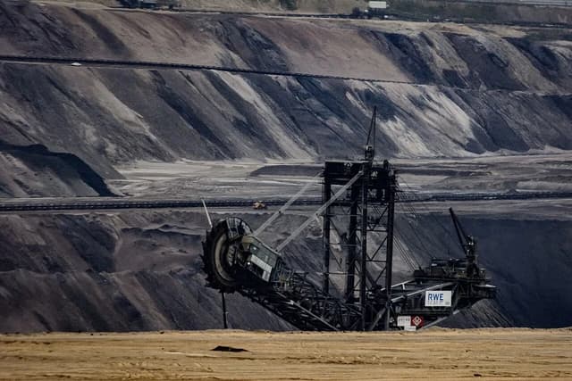 Giant bucket-wheel excavator working in an open-pit lignite mine.