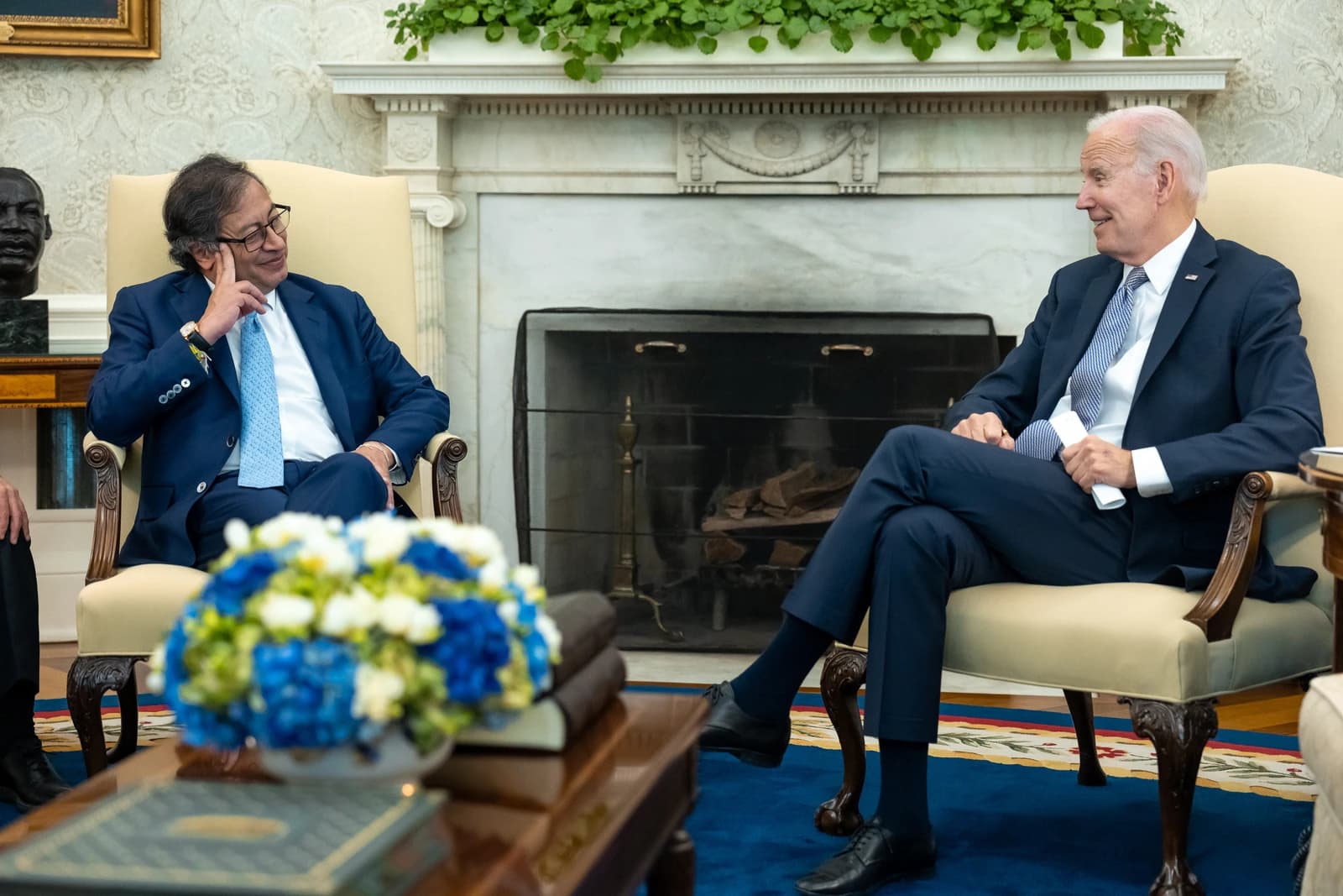 President Joe Biden and Colombian President Gustavo Petro sitting in armchairs.