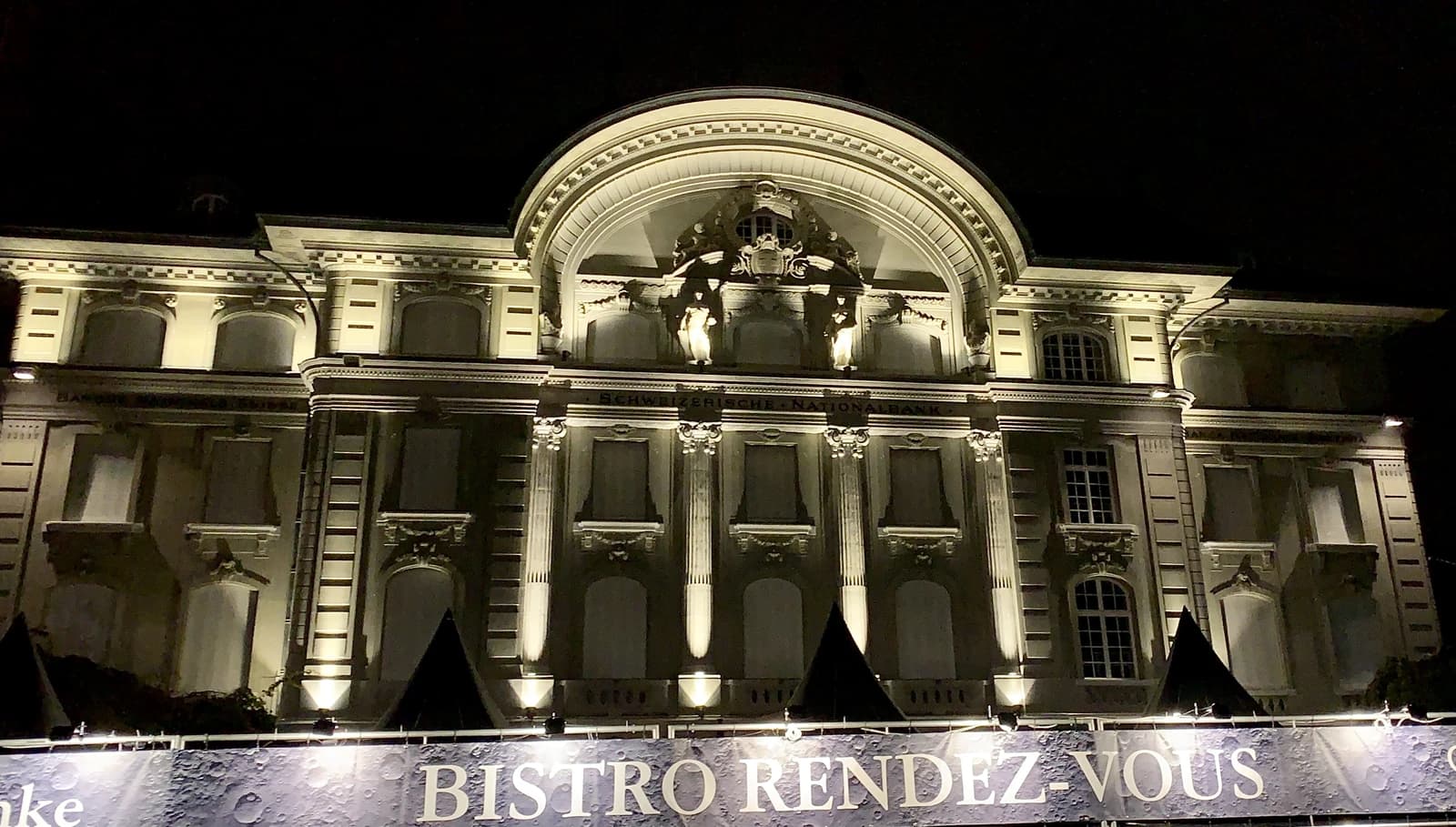 Swiss National Bank headquarters building, illuminated at night on Bundesplatz, Bern, Switzerland.