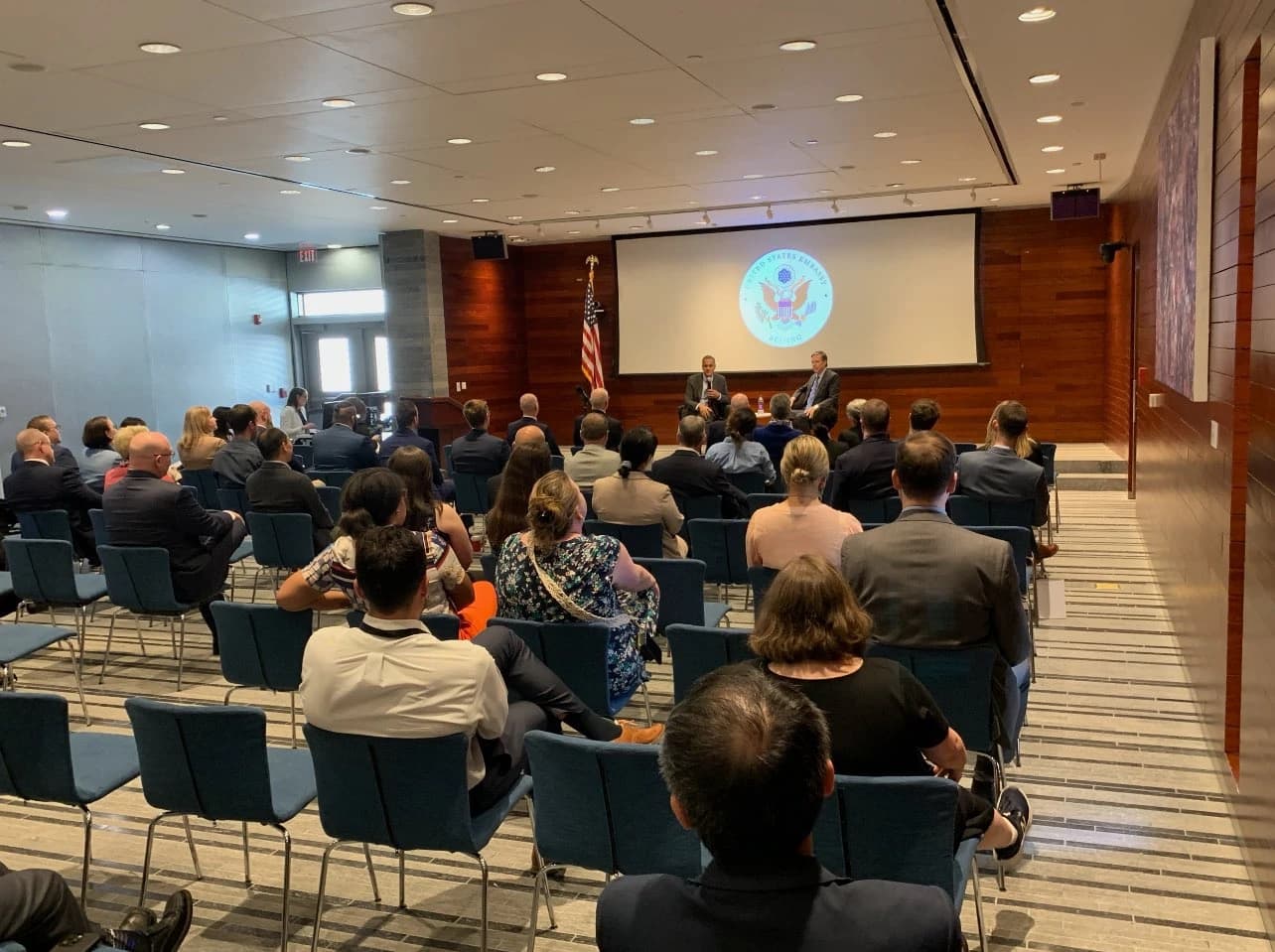 Deputy Secretary Verma and Ambassador Burns speaking to an audience at the U.S. Embassy in Beijing.