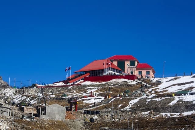 Buildings with red roofs at Nathu La border, India-China frontier.