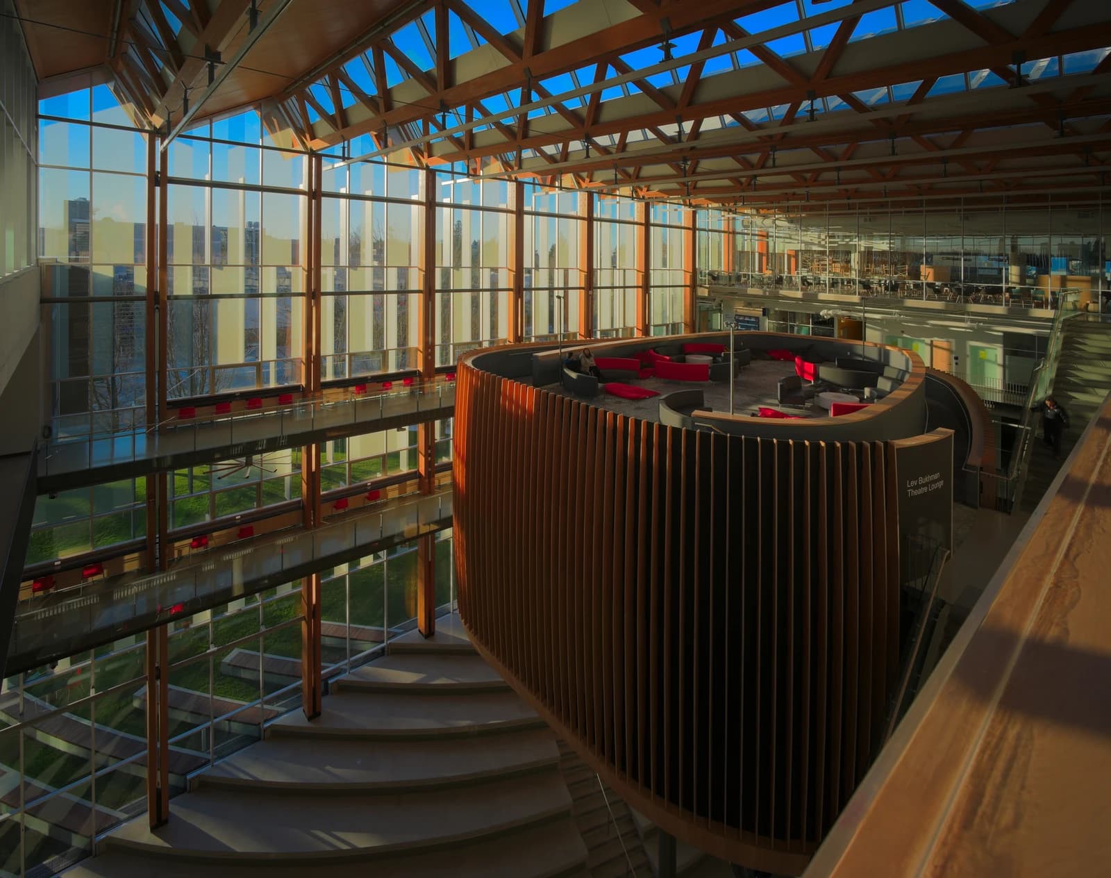 Interior of the UBC Student Union Building with seating areas and large windows.