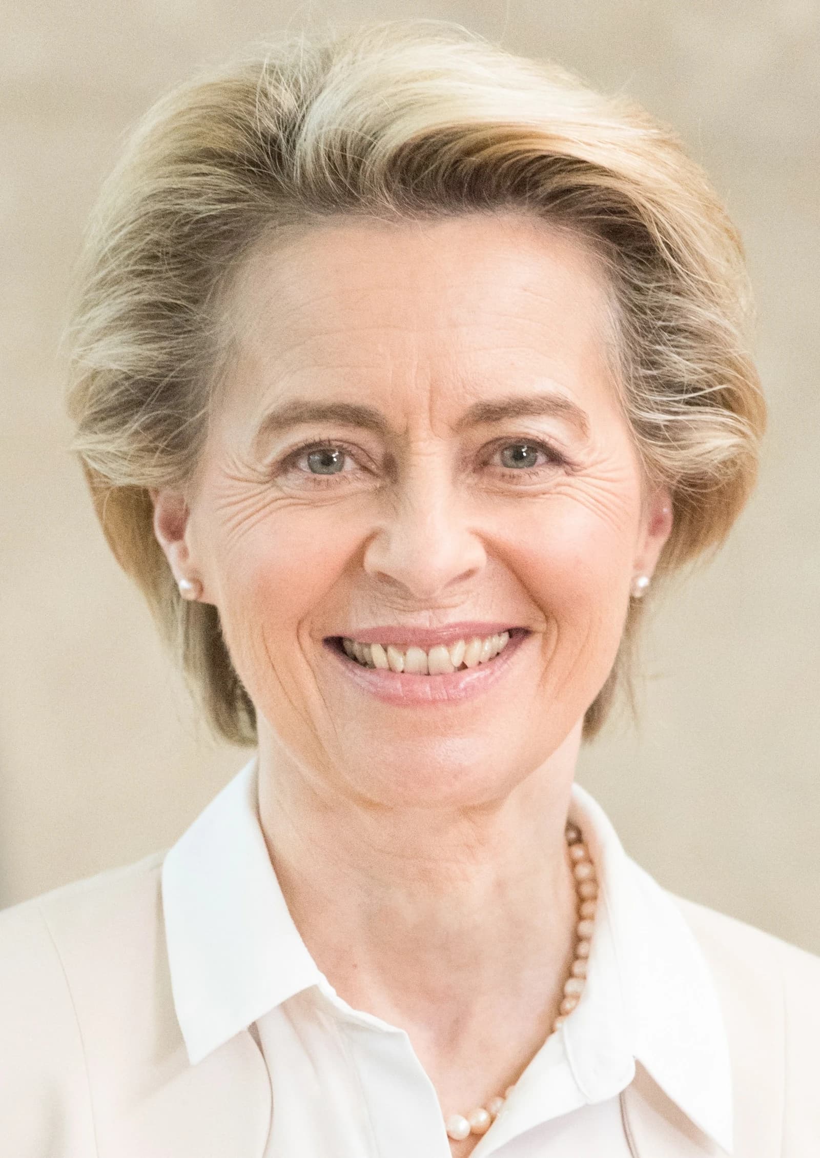 Ursula von der Leyen, President of the European Commission, smiling in an official portrait.