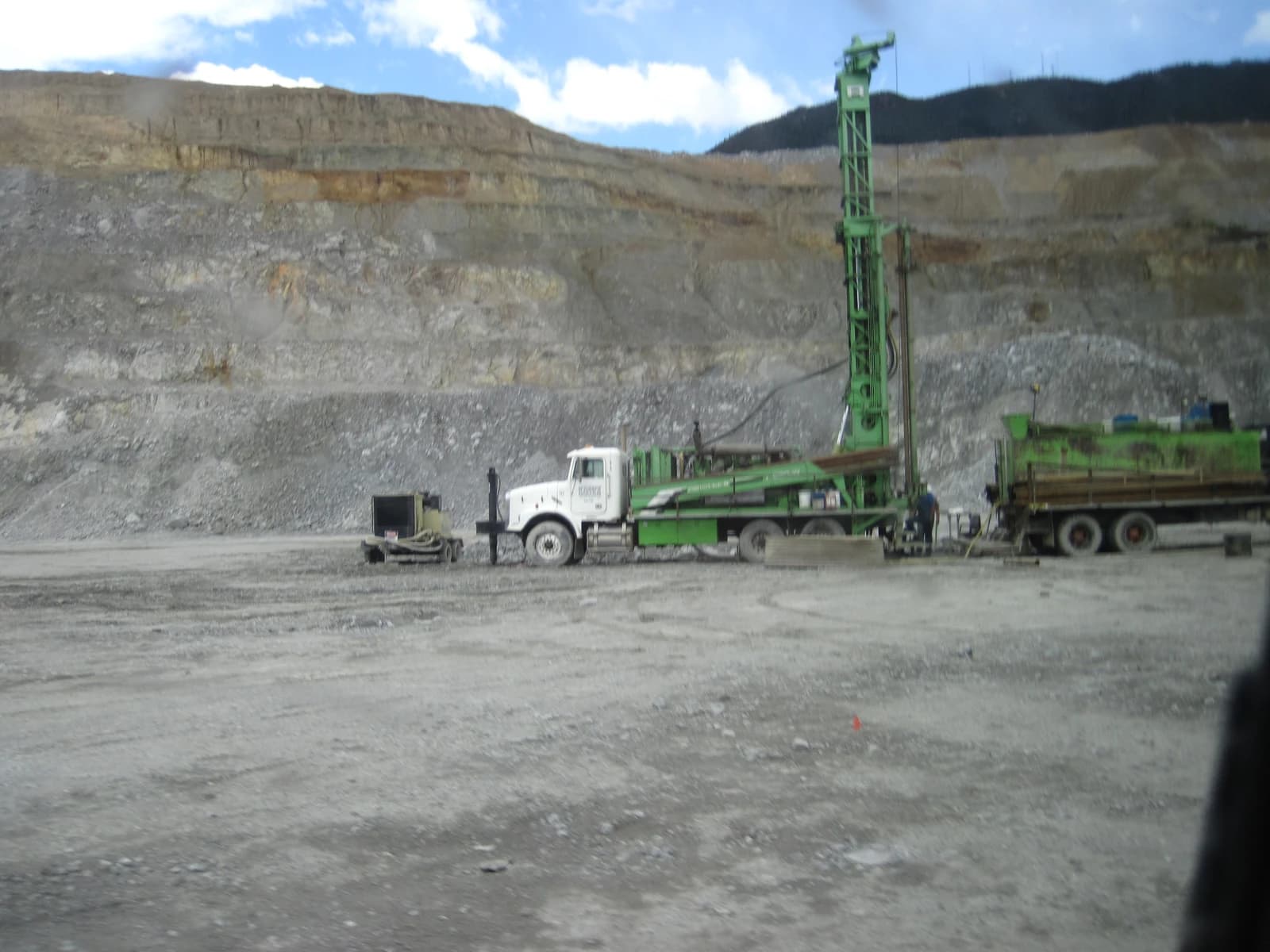 Drilling rig, equipment, and trucks at the Continental Mine in Butte, Montana.