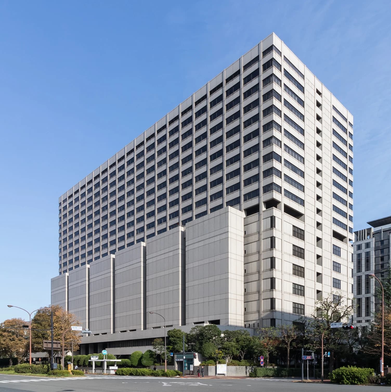 Exterior of the Tokyo Court Complex Building, a large, rectangular high-rise structure.