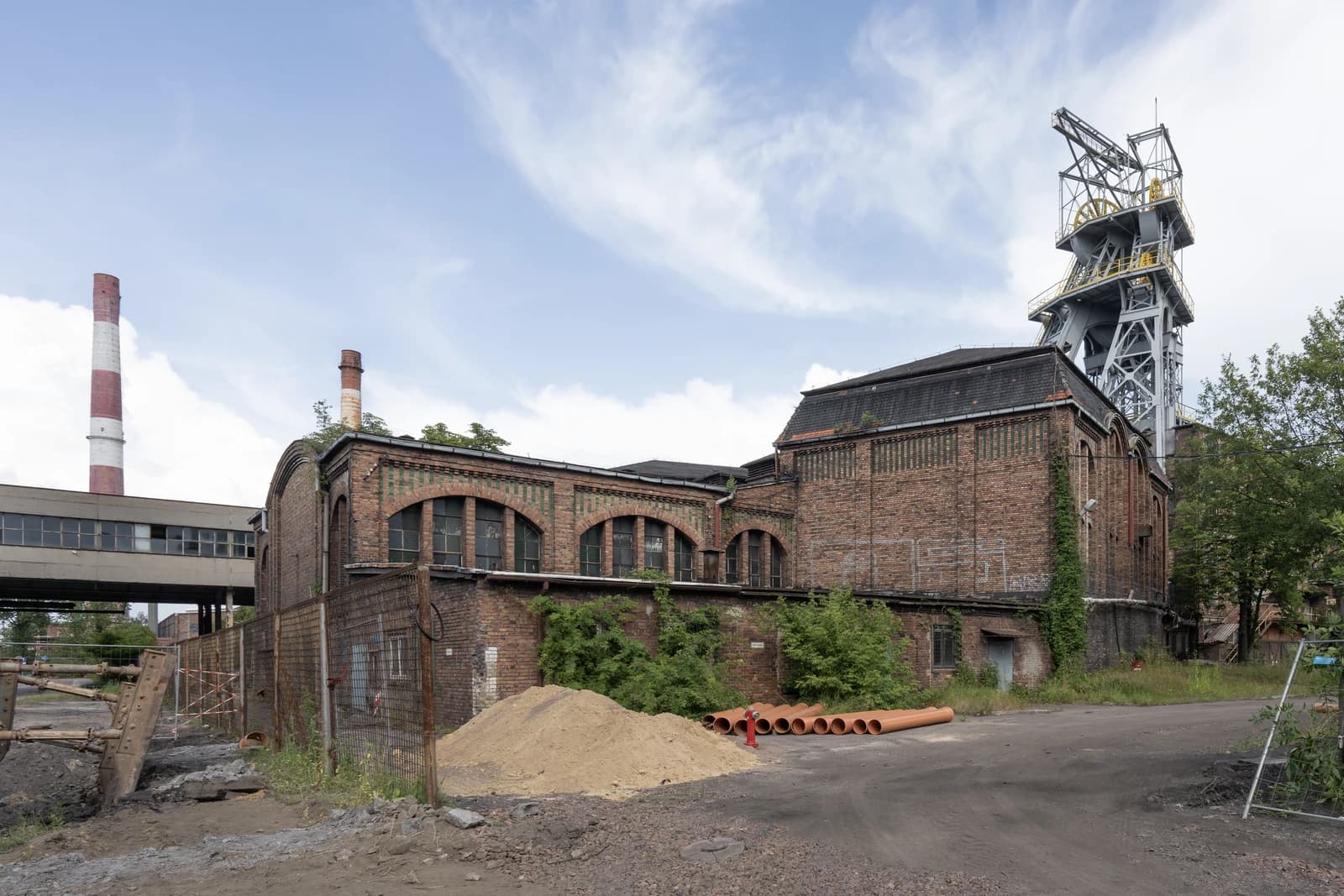 Exterior view of the historic Pułaski shaft complex at Wieczorek Coal Mine in Katowice.