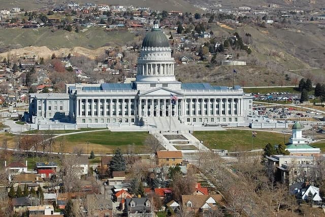 Utah State Capitol Building seen from an elevated perspective with surrounding cityscape.