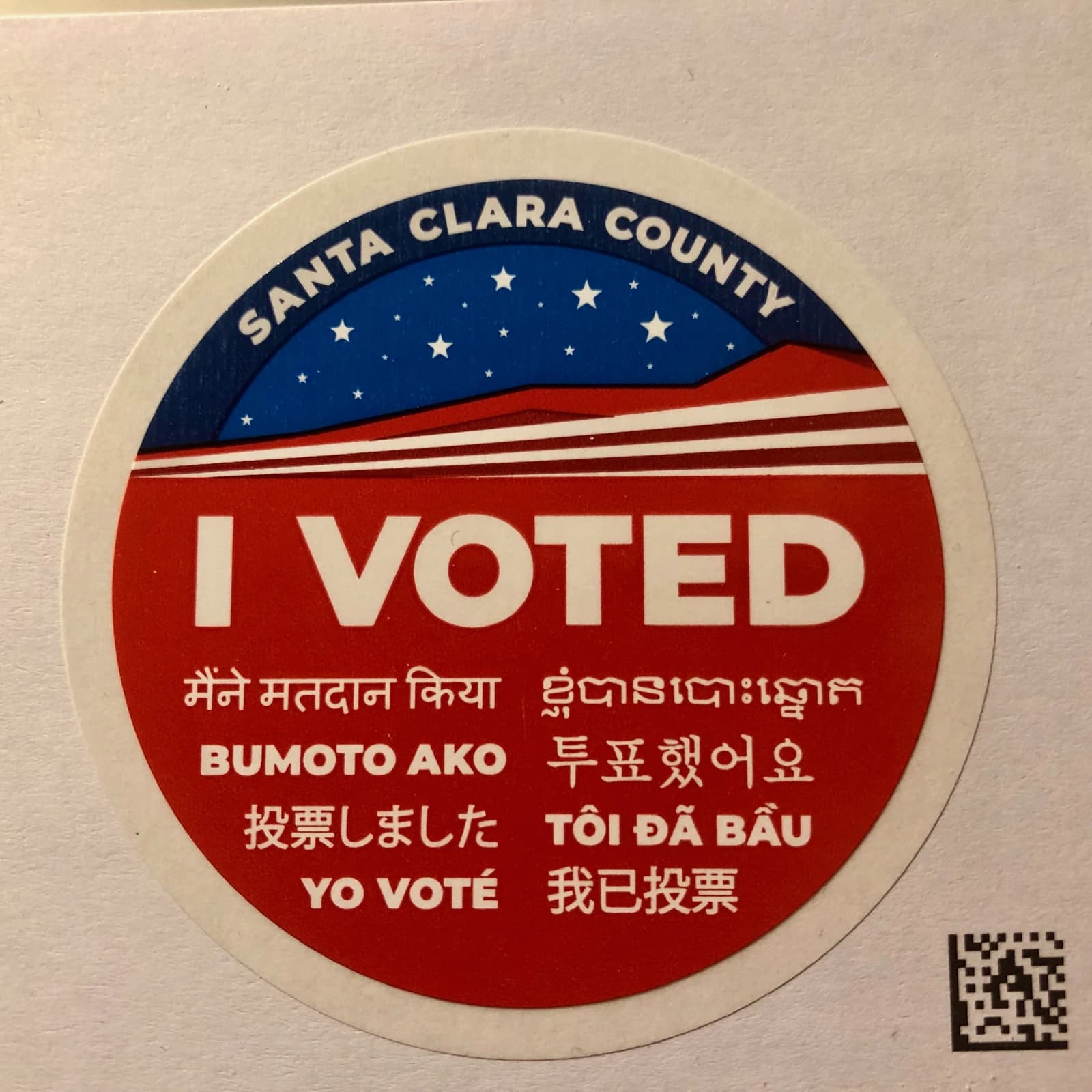 'I Voted' sticker from Santa Clara County, California, printed in multiple languages.