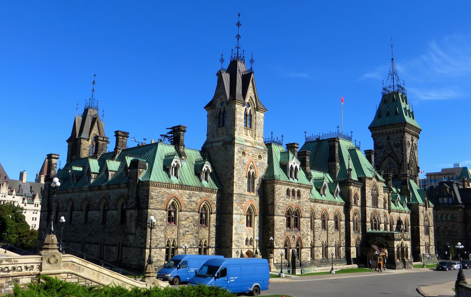 East Block, Parliament Hill, Ottawa, Ontario, a large stone building with multiple towers and green roofs.