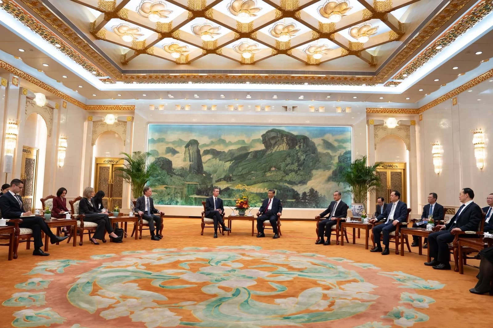 California Governor Gavin Newsom and Chinese President Xi Jinping seated during a meeting in Beijing.