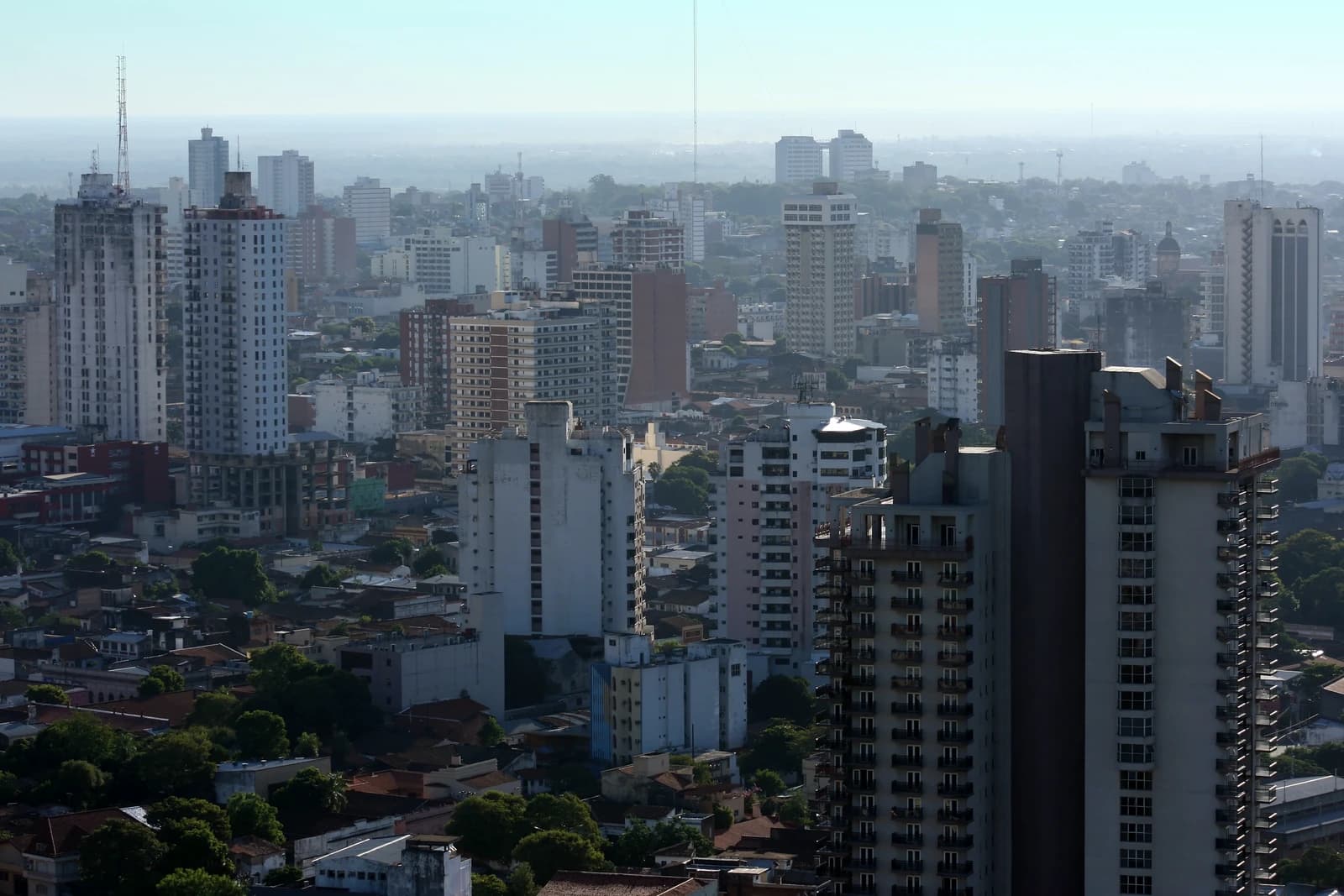 Aerial view of downtown Asunción, Paraguay, showing numerous residential and commercial buildings.