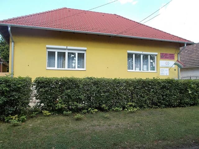 Exterior view of the yellow building housing the Miner Trade Union headquarters.