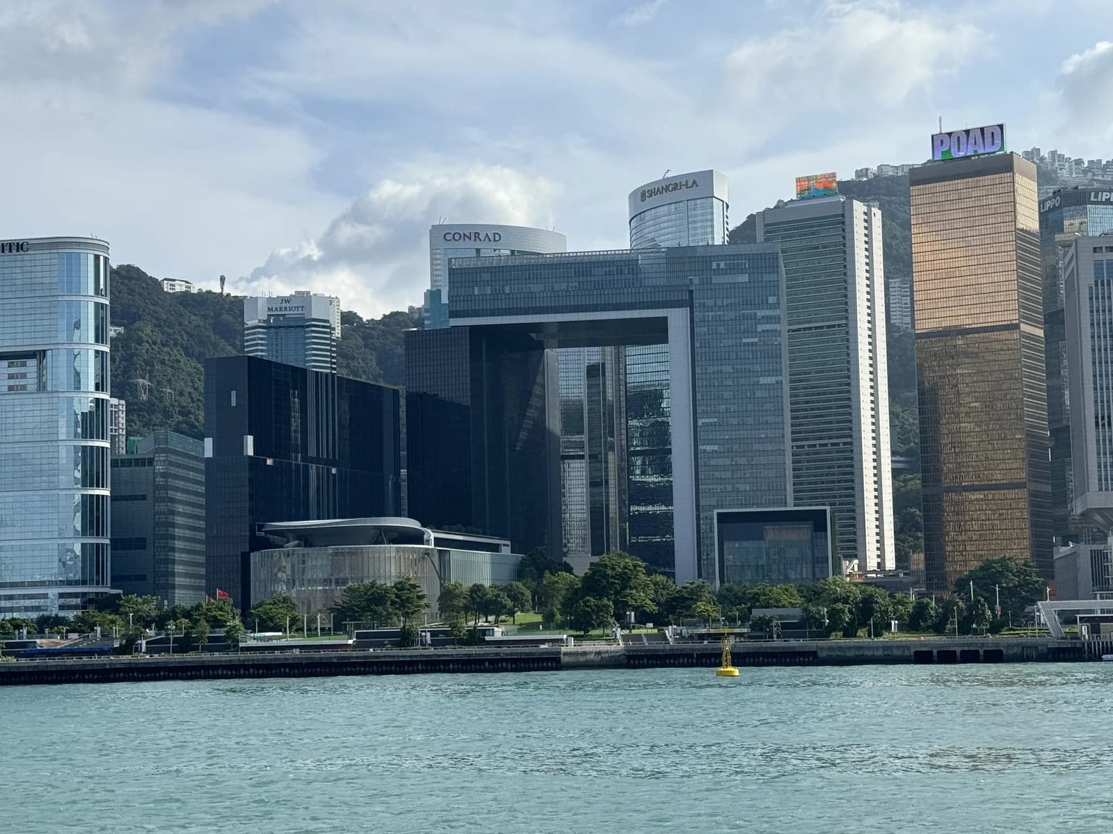 Central Government Offices and Legislative Council of Hong Kong buildings on the waterfront.