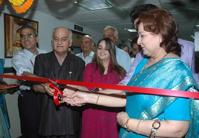 Prabhat C. Chaturvedi, Secretary, Ministry of Labour and Employment, cuts a ribbon.