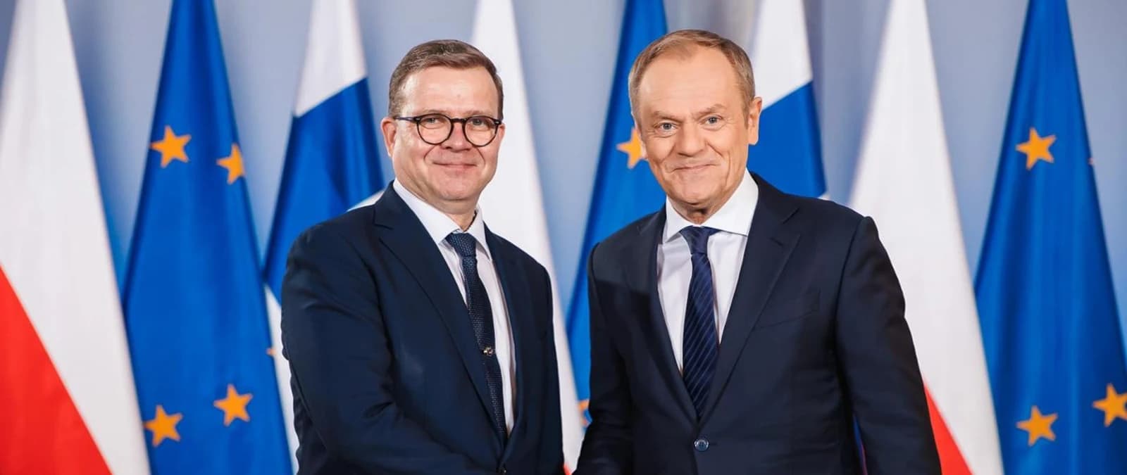 Donald Tusk, Prime Minister of Poland, and Petteri Orpo, Prime Minister of Finland, standing at the Chancellery in Warsaw.