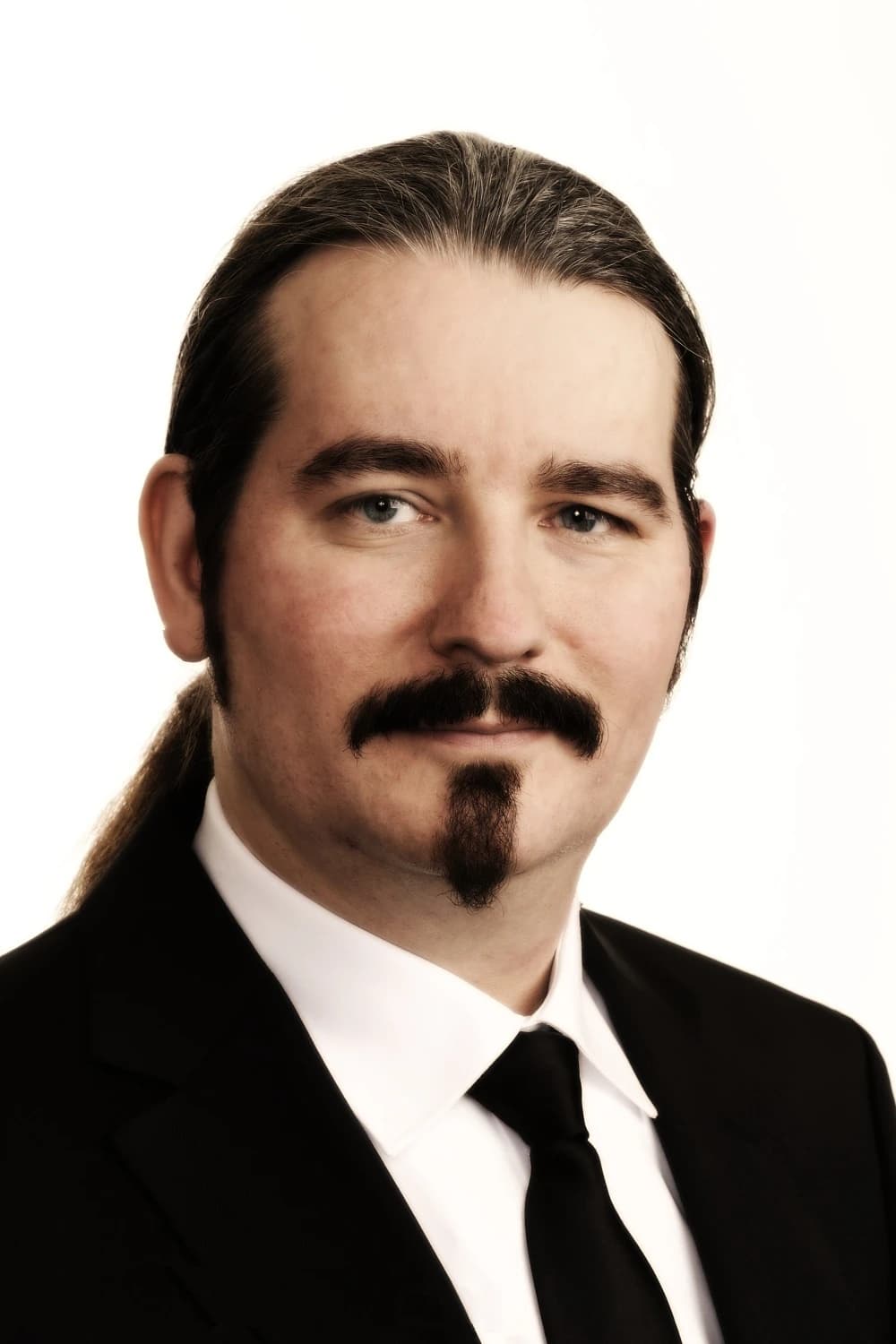 Niklas Nikolajsen, founder of Bitcoin Suisse, against a plain background.