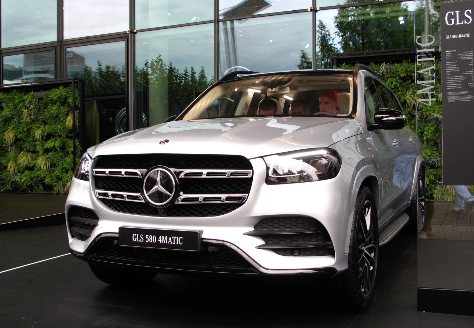 Silver Mercedes-Benz GLS 580 4MATIC SUV on display, front view.