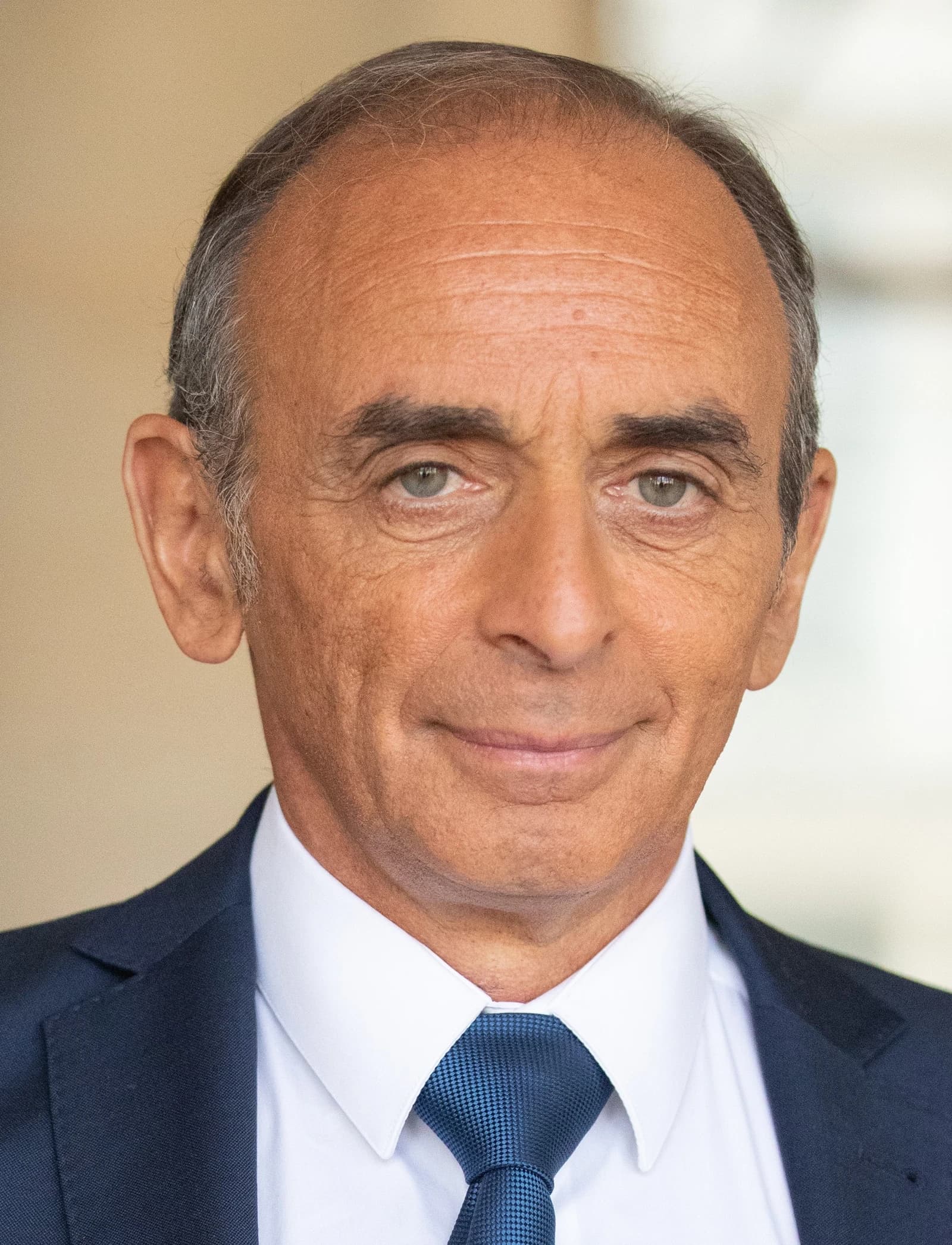 Éric Zemmour, French political candidate, looking forward in a portrait shot.