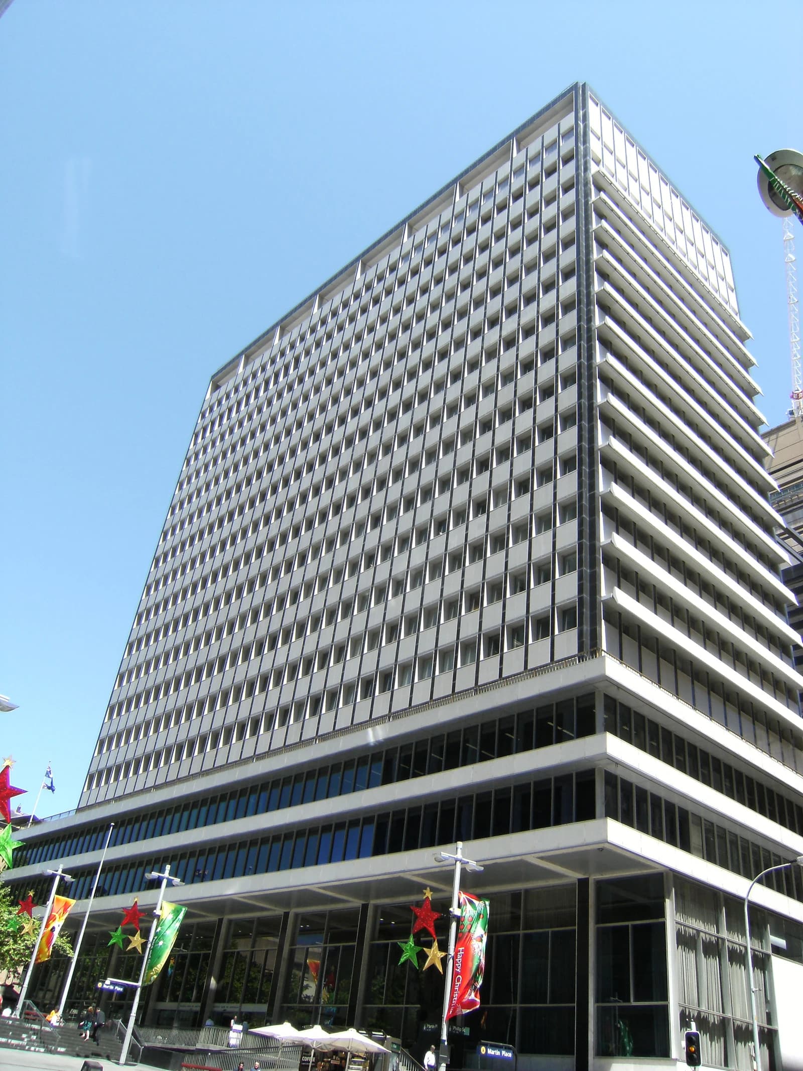 Exterior view of the Reserve Bank of Australia building in Sydney on a clear day.